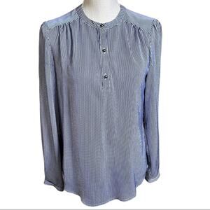 Twik long sleeve polyester blouse.
